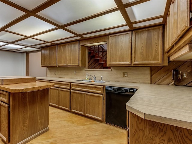 1501 S Avery Ave, Midwest City, OK 73130 - kitchen with dishwasher, decorative backsplash, wood counters, light wood-style flooring, and brown cabinetry