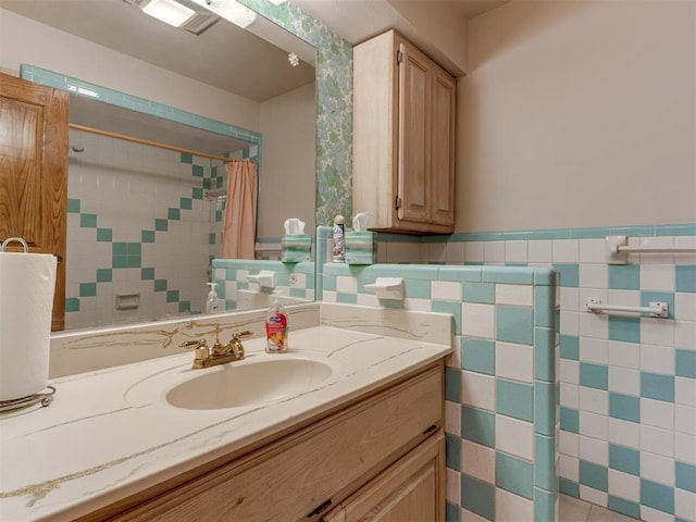 1501 S Avery Ave, Midwest City, OK 73130 - bathroom featuring vanity, a shower with curtain, tile walls, and wainscoting