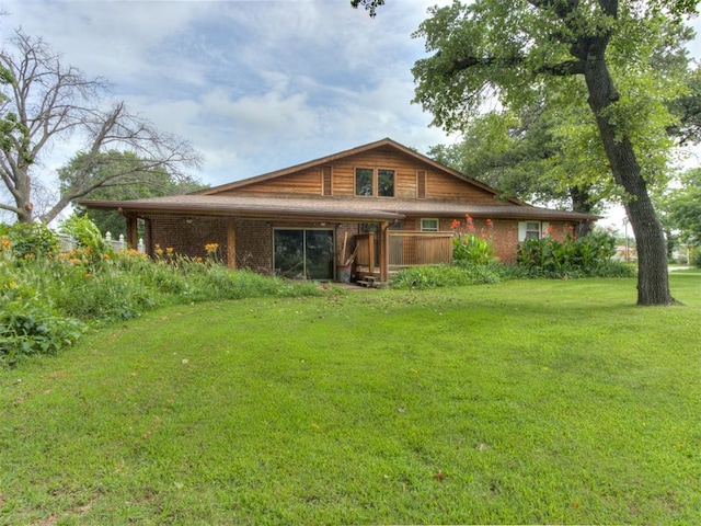 1501 S Avery Ave, Midwest City, OK 73130 - view of front of property with a front lawn and brick siding