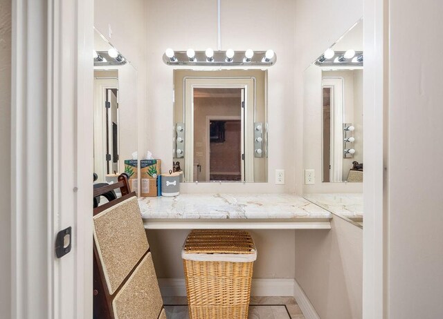 bathroom with tile patterned flooring