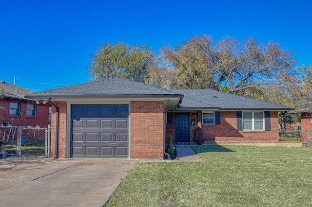 ranch-style home with a garage and a front lawn