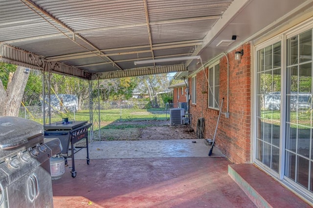 view of patio / terrace featuring central air condition unit and a grill