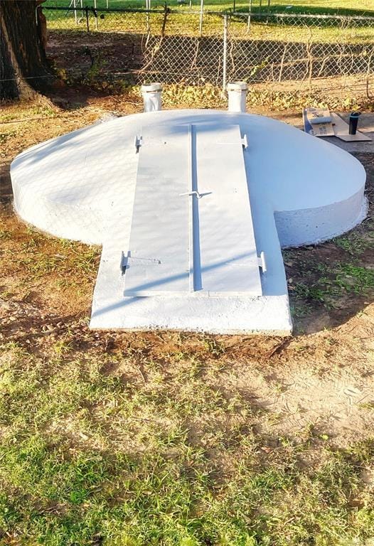 view of entry to storm shelter