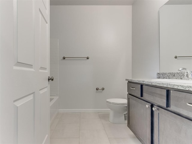 full bathroom featuring toilet, vanity, tile patterned floors, and  shower combination