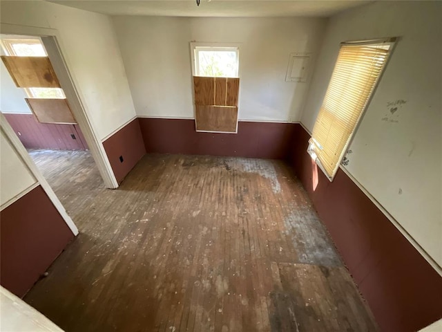 unfurnished room featuring dark hardwood / wood-style floors