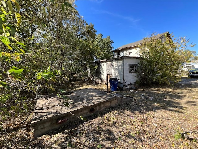 view of side of property with a deck