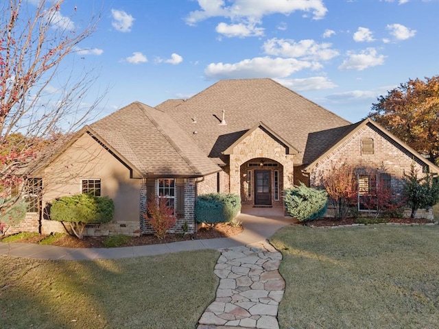 view of front of property with a front yard