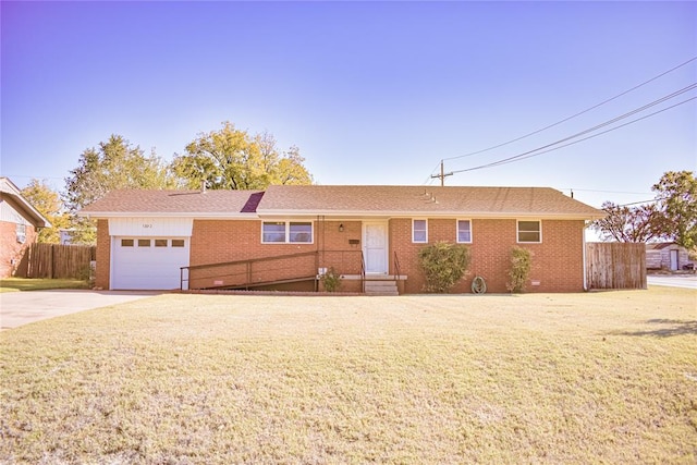 ranch-style house featuring a garage