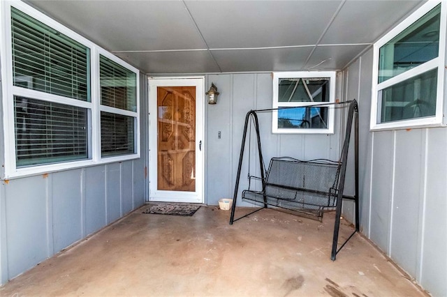 property entrance with a patio