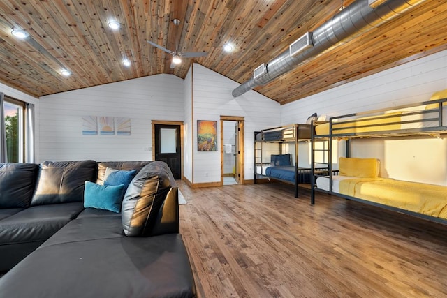 living room with wooden walls, ceiling fan, wood-type flooring, high vaulted ceiling, and wood ceiling