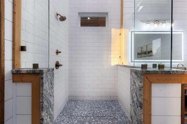 bathroom with tiled shower