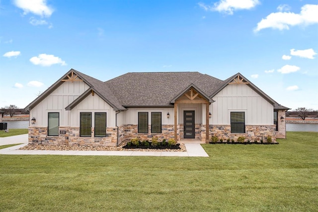 view of front of home featuring french doors and a front lawn