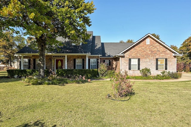 ranch-style house with a front lawn