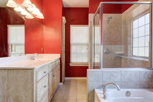 bathroom featuring tile patterned floors and a healthy amount of sunlight