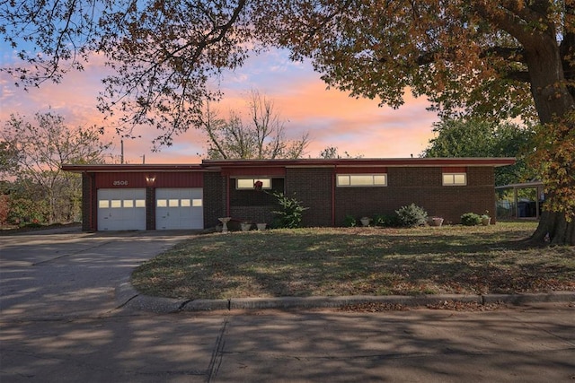 single story home with a garage