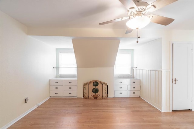 additional living space featuring ceiling fan and light hardwood / wood-style floors