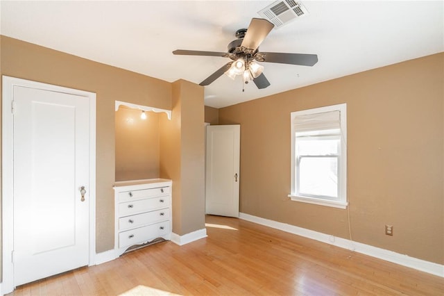 unfurnished bedroom featuring ceiling fan and light hardwood / wood-style floors