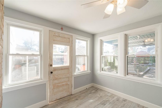 entryway featuring ceiling fan and light hardwood / wood-style flooring