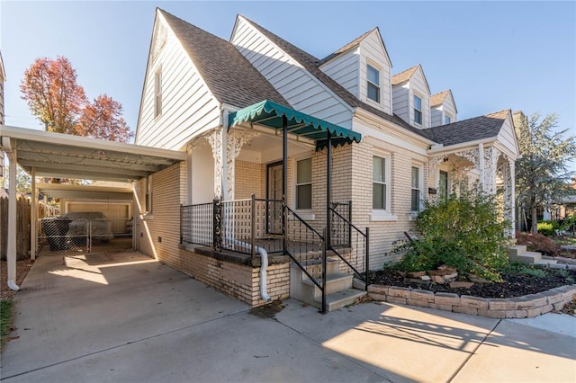 view of front of property with a carport