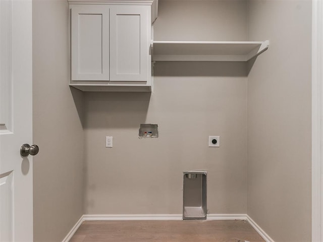 laundry room featuring washer hookup, wood finished floors, baseboards, cabinet space, and electric dryer hookup