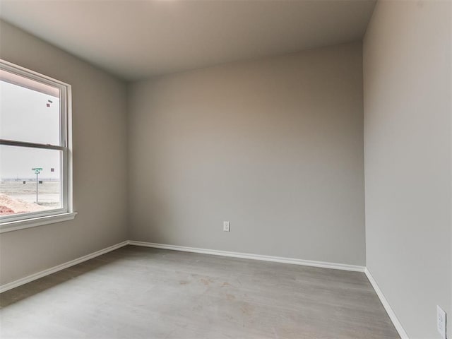 empty room with baseboards