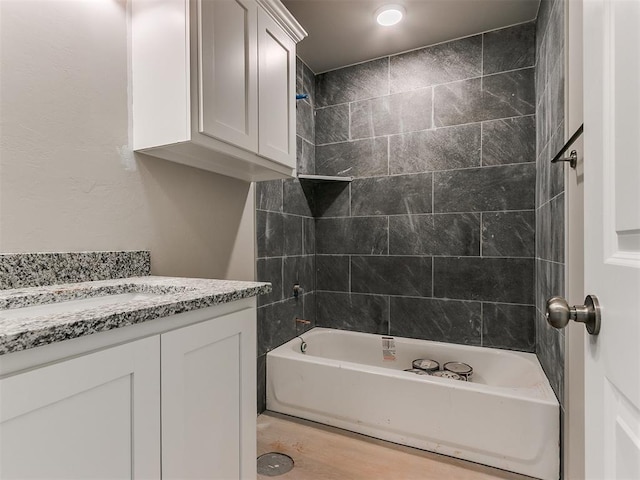 full bath featuring bathtub / shower combination and vanity