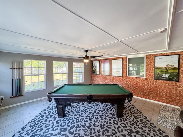 playroom with brick wall, tile patterned flooring, ceiling fan, and billiards