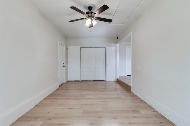 unfurnished bedroom featuring ceiling fan and light hardwood / wood-style flooring