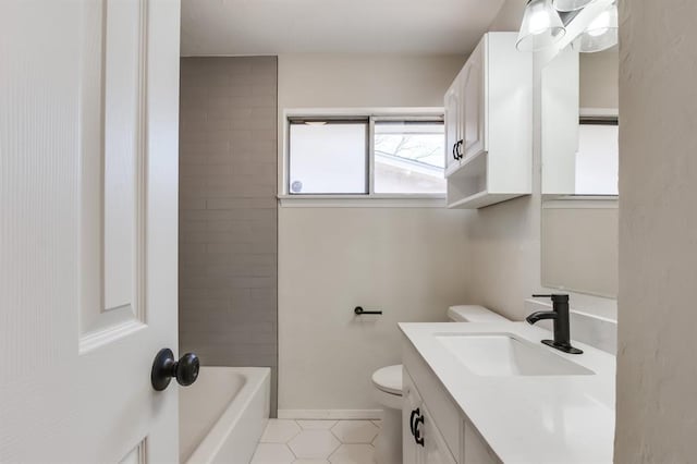 full bathroom with tile patterned floors, vanity, toilet, and tiled shower / bath