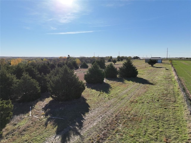 exterior space with a rural view