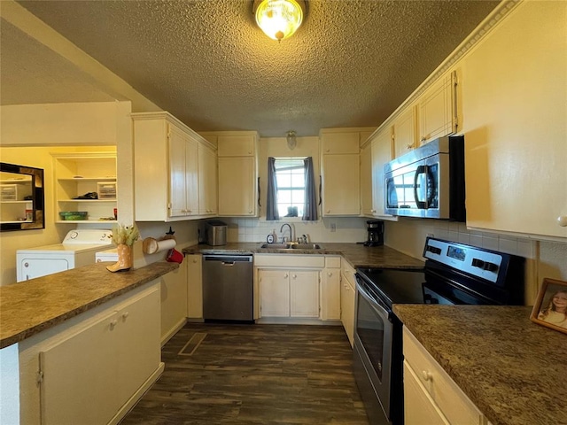 kitchen featuring dark hardwood / wood-style floors, sink, stainless steel appliances, and tasteful backsplash