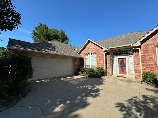 single story home featuring a garage