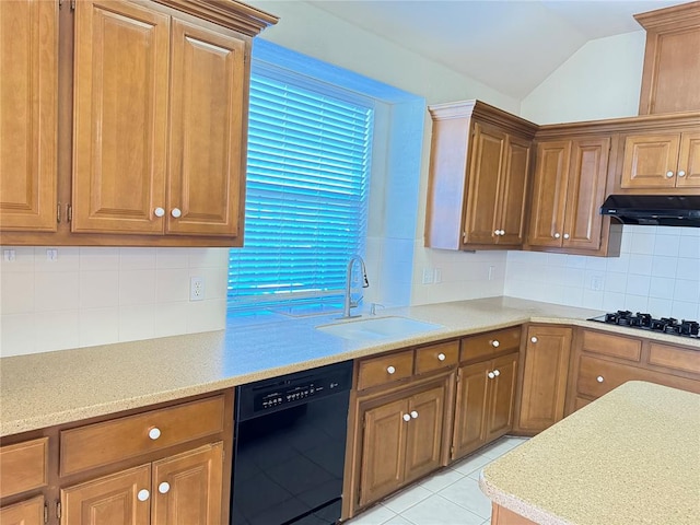 kitchen featuring gas cooktop, decorative backsplash, sink, black dishwasher, and lofted ceiling