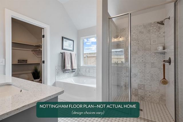 bathroom featuring separate shower and tub, vanity, and vaulted ceiling