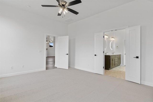 729 Caladium Dr, Yukon, OK 73099 - unfurnished bedroom with light carpet, visible vents, ensuite bathroom, and baseboards