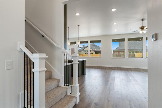 729 Caladium Dr, Yukon, OK 73099 - staircase with ceiling fan, baseboards, wood finished floors, and recessed lighting