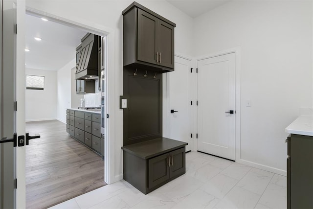 729 Caladium Dr, Yukon, OK 73099 - mudroom with marble finish floor and baseboards