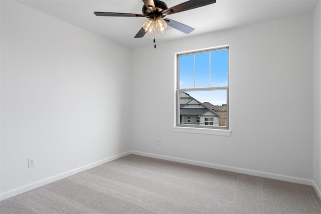 729 Caladium Dr, Yukon, OK 73099 - spare room with baseboards, carpet, and a ceiling fan