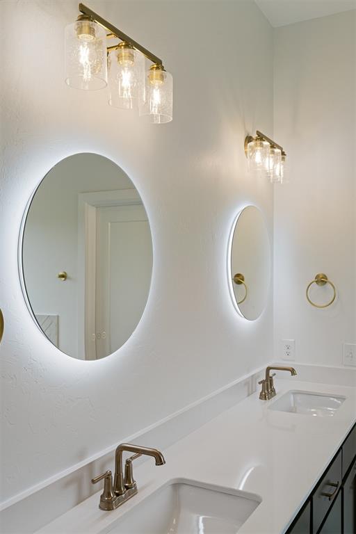 729 Caladium Dr, Yukon, OK 73099 - bathroom with a sink and double vanity
