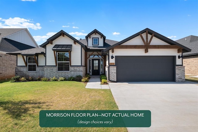 view of front of home featuring a garage and a front lawn