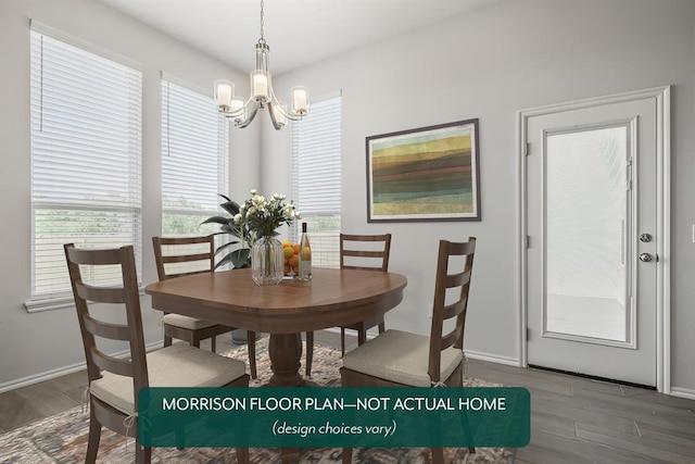 dining room with an inviting chandelier and hardwood / wood-style flooring