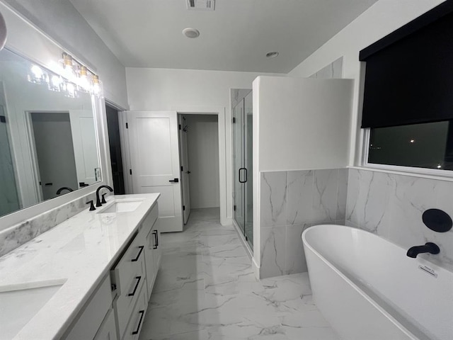 bathroom with vanity, tile walls, and plus walk in shower