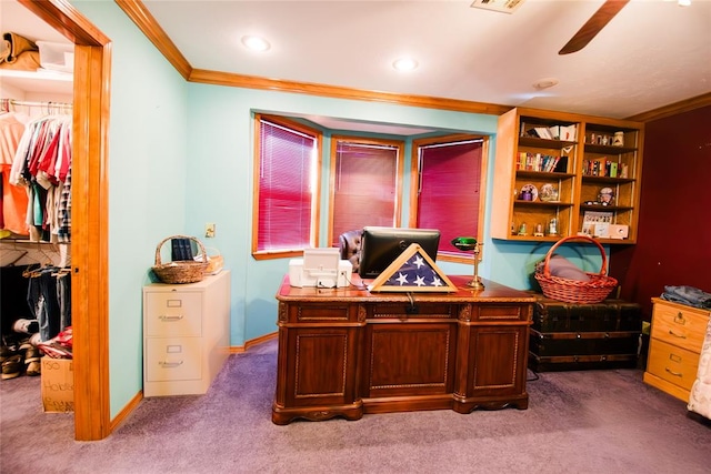 office space featuring carpet flooring, ceiling fan, and ornamental molding