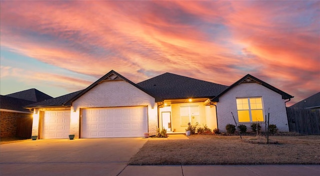 view of front of property with a garage