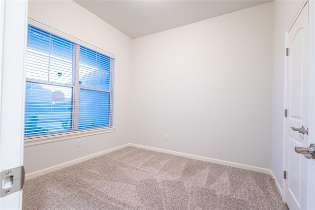 empty room featuring carpet flooring