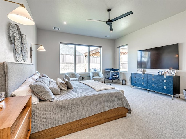 carpeted bedroom featuring ceiling fan