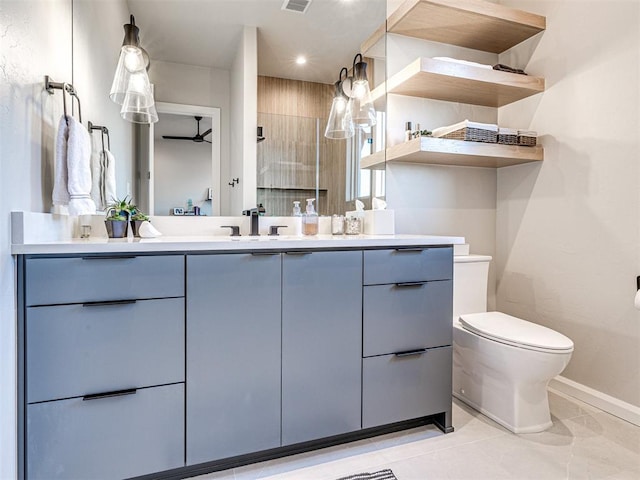 bathroom with an enclosed shower, vanity, and toilet