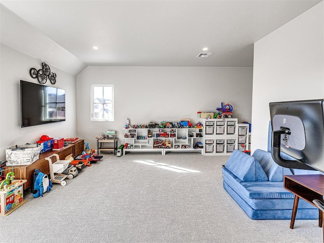 playroom with carpet and lofted ceiling