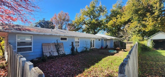 view of property exterior with a yard