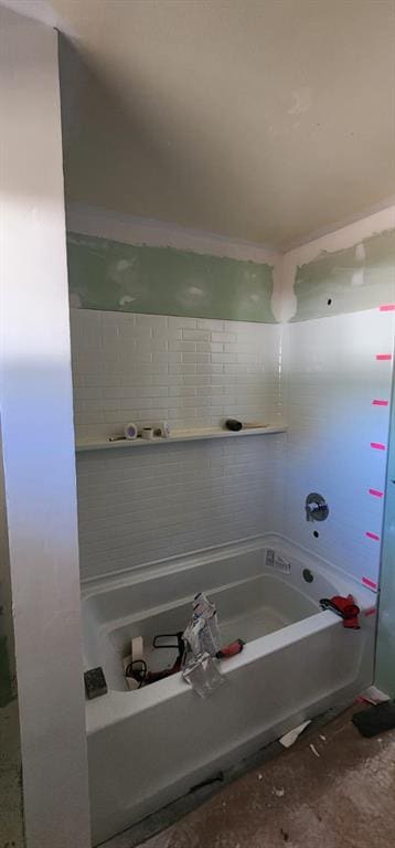 bathroom with shower / washtub combination